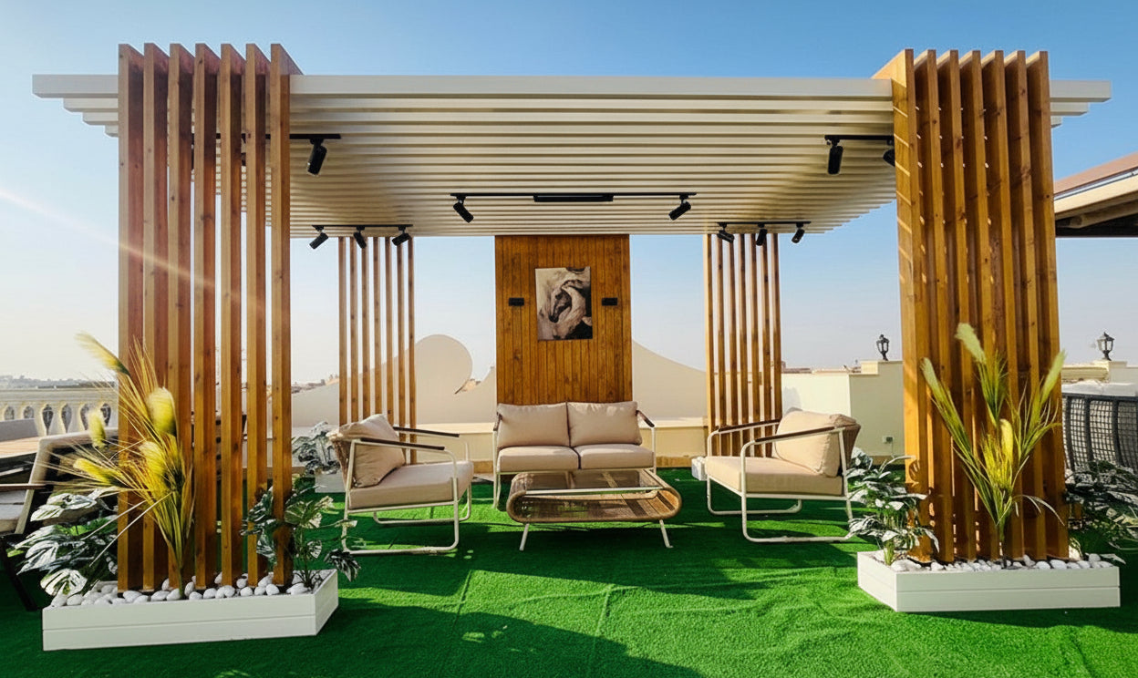 Outdoor patio area with wooden pergola, furniture, and plants on a sunny day.